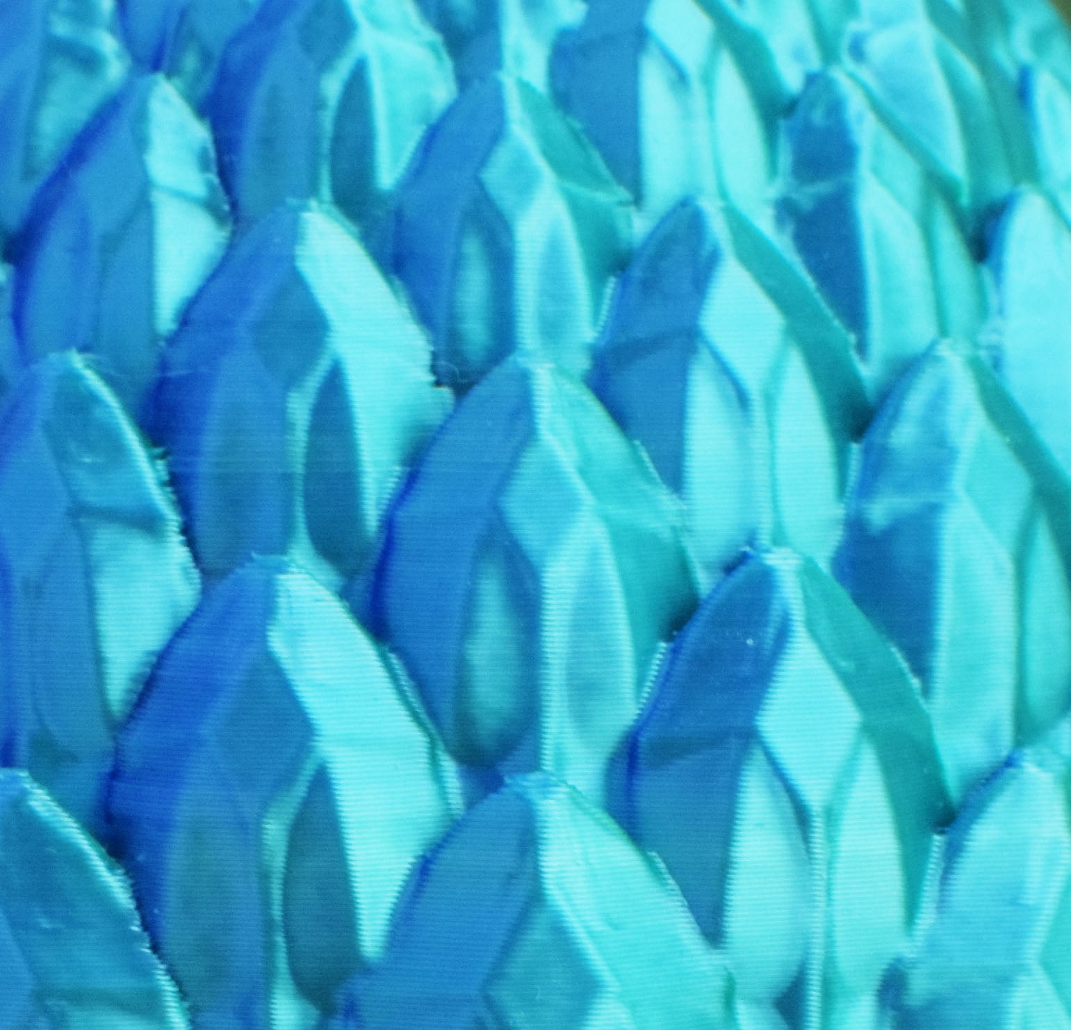 Close-up of blue and green textured dragon egg 